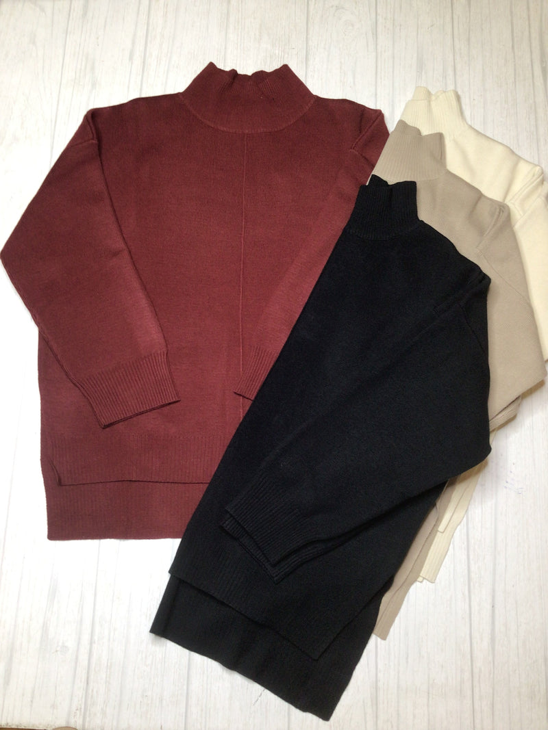 Seam front knit sweater